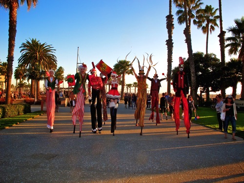 Fun Headed Your Way 
Stilt Circus Beach Walk